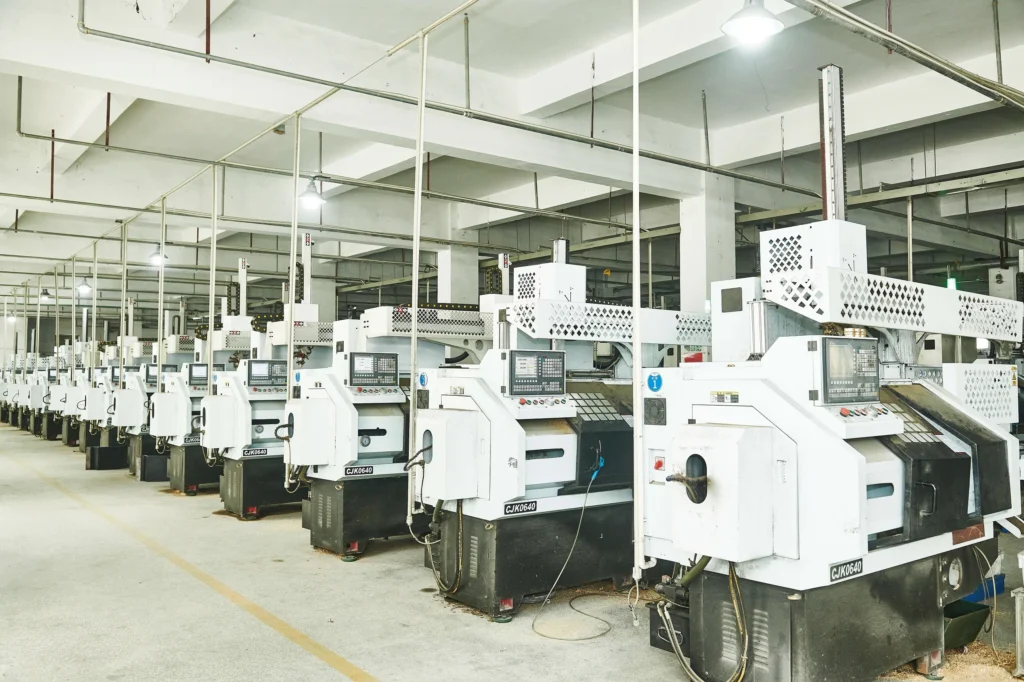 Factory floor with rows of CNC machines