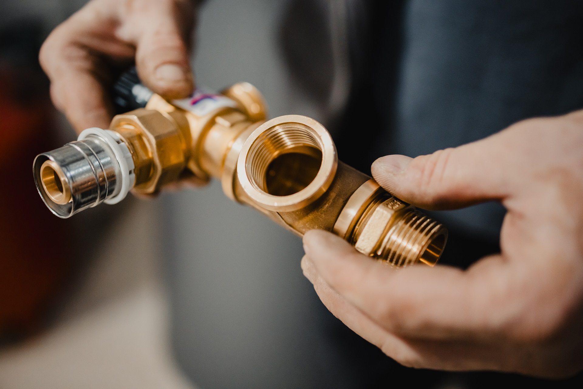 Brass insert plumbing fitting close-up