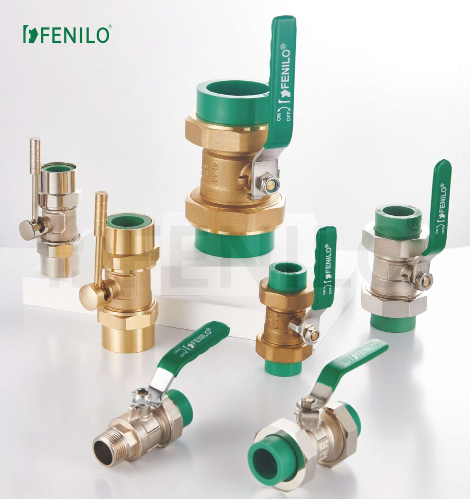 Assortment of green handle ball valves and fittings